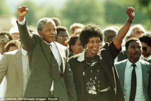 Winnie and Nelson Mandela, hand in hand after Nelson is released from prison after 27 years. 